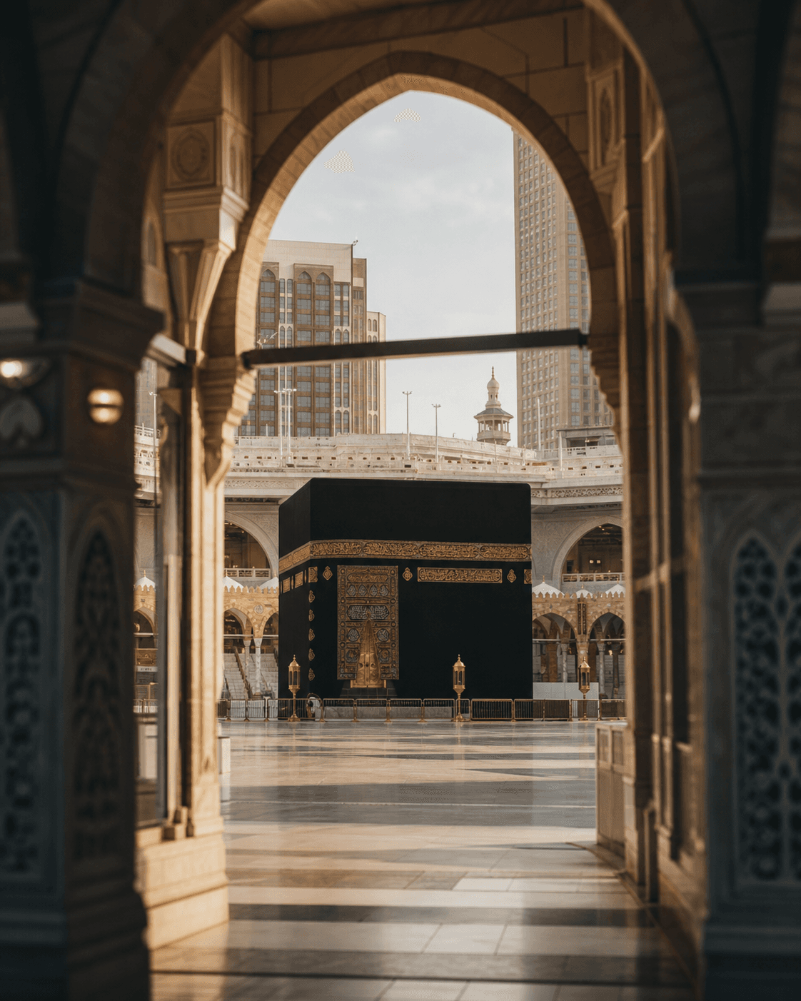 The Kaaba framed by an arch at Masjid al-Haram