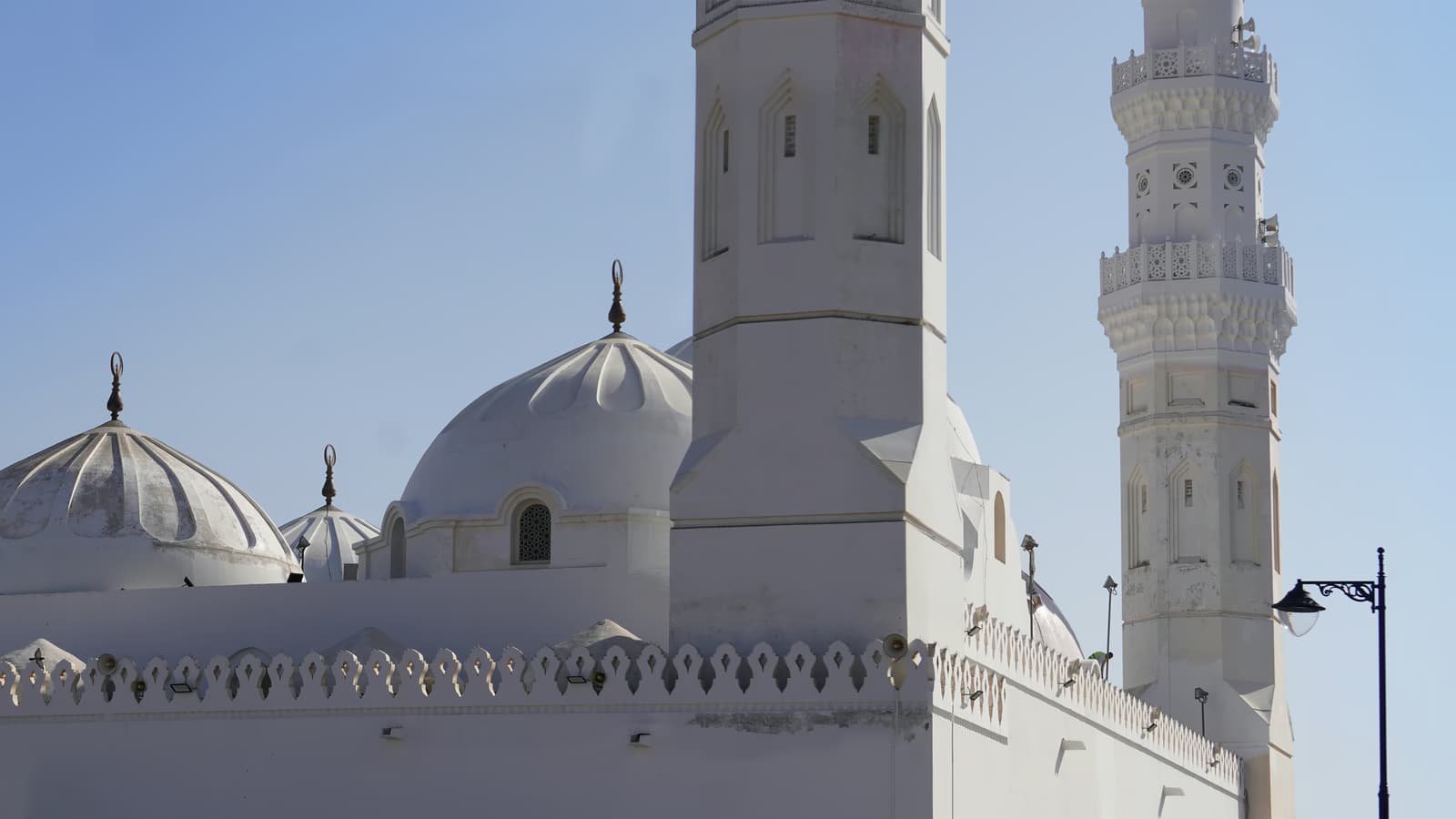 The white domes and minarets of Quba Mosque in Madinah